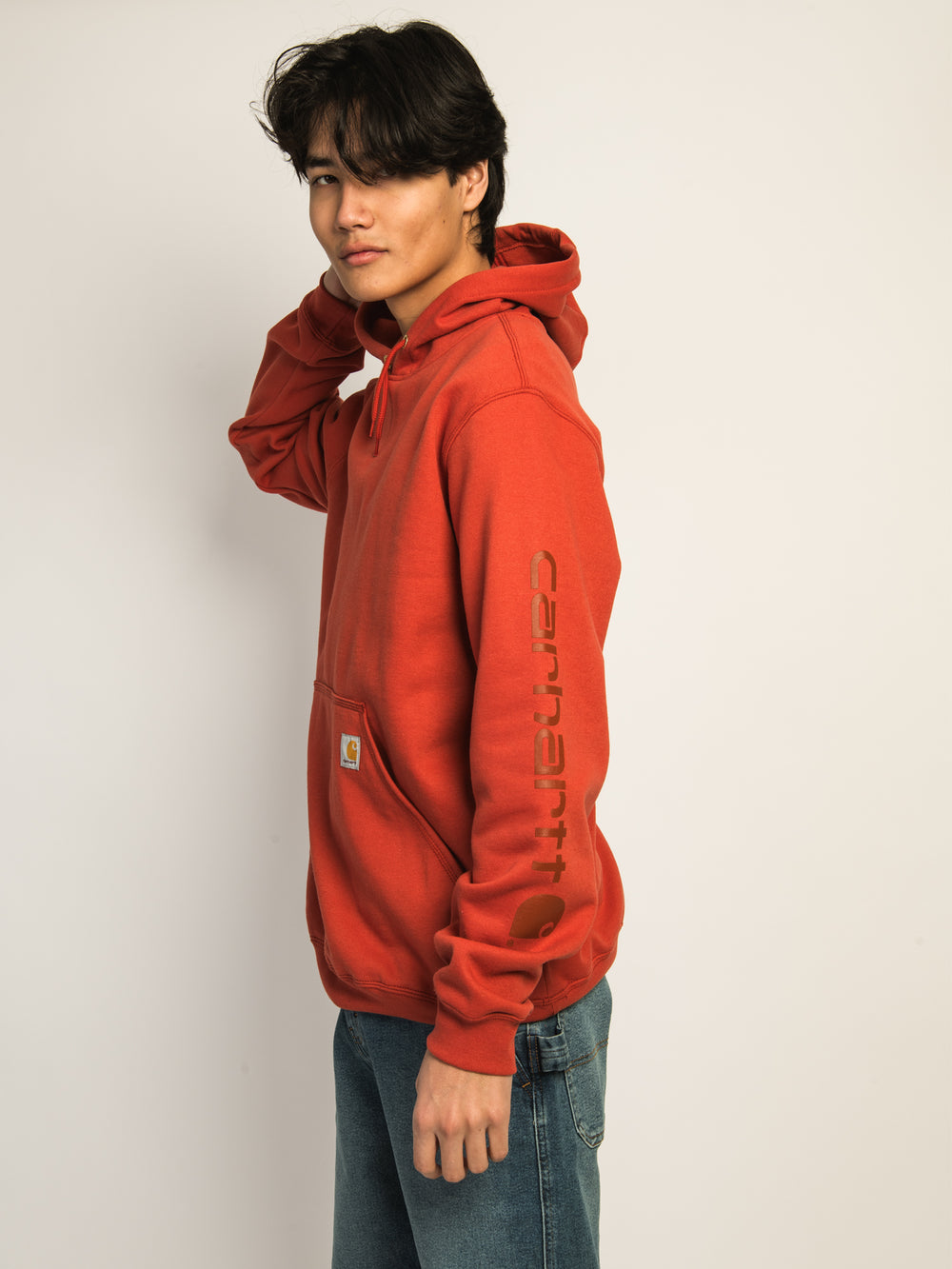 CARHARTT LOGO SLEEVE GRAPHIC PULL OVER HOODIE - SADDLE RED