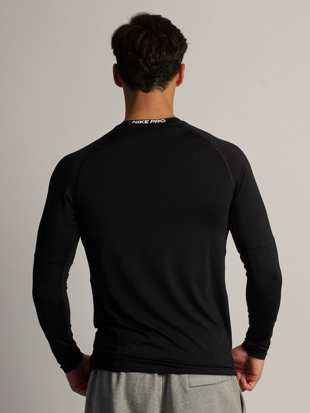 NIKE DRI-FIT LONG SLEEVE FITNESS TOP - BLACK