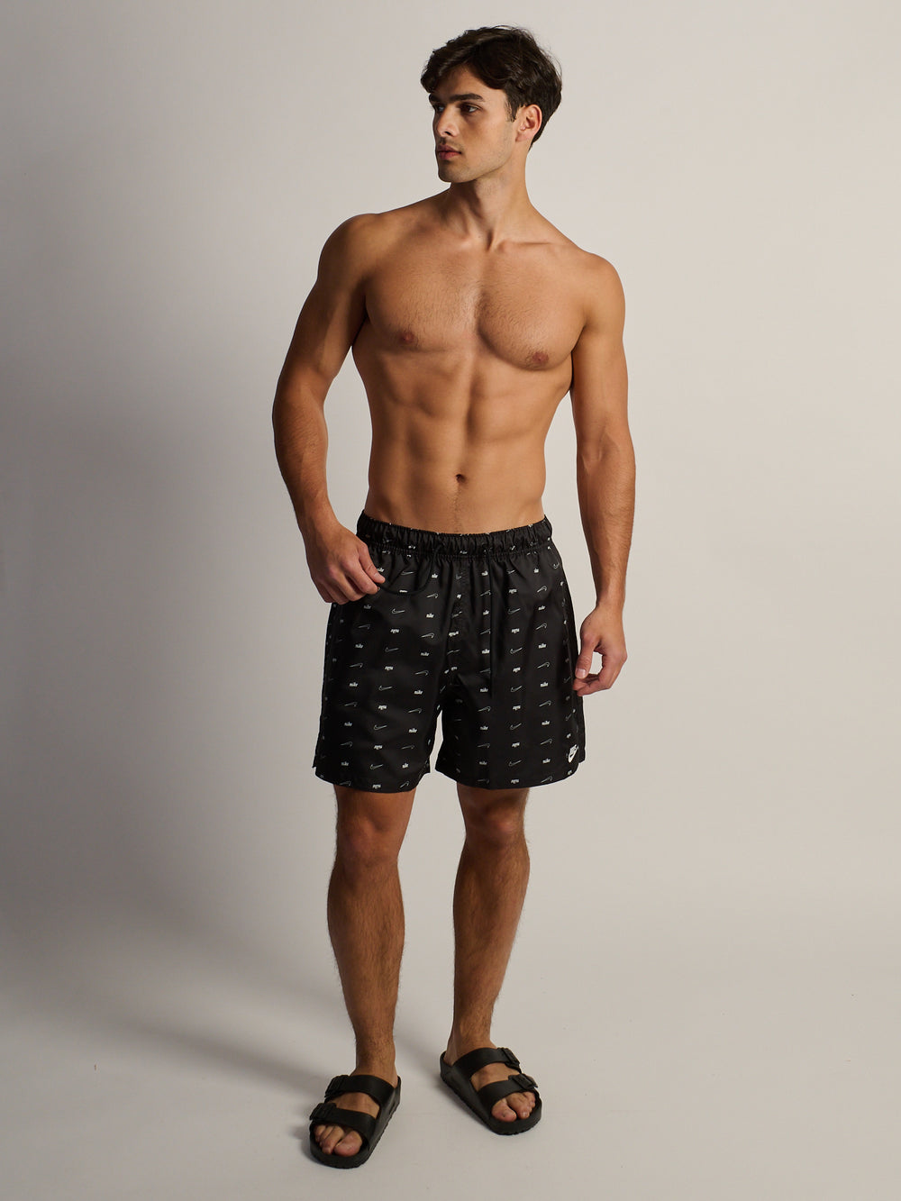 NIKE CLUB WOVEN ALL OVER PRINT FLOW SHORT