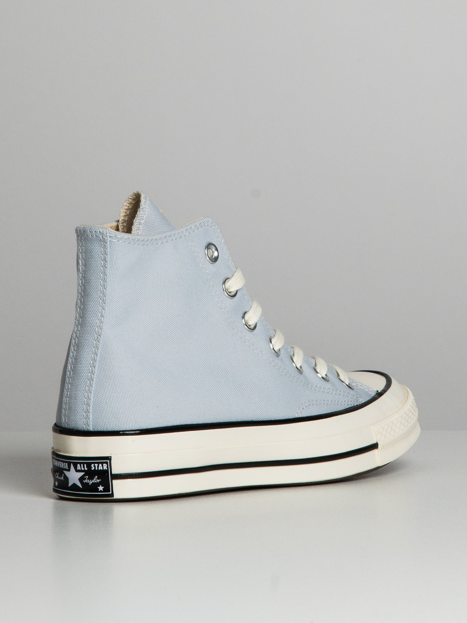 Light blue converse 2024 high tops womens