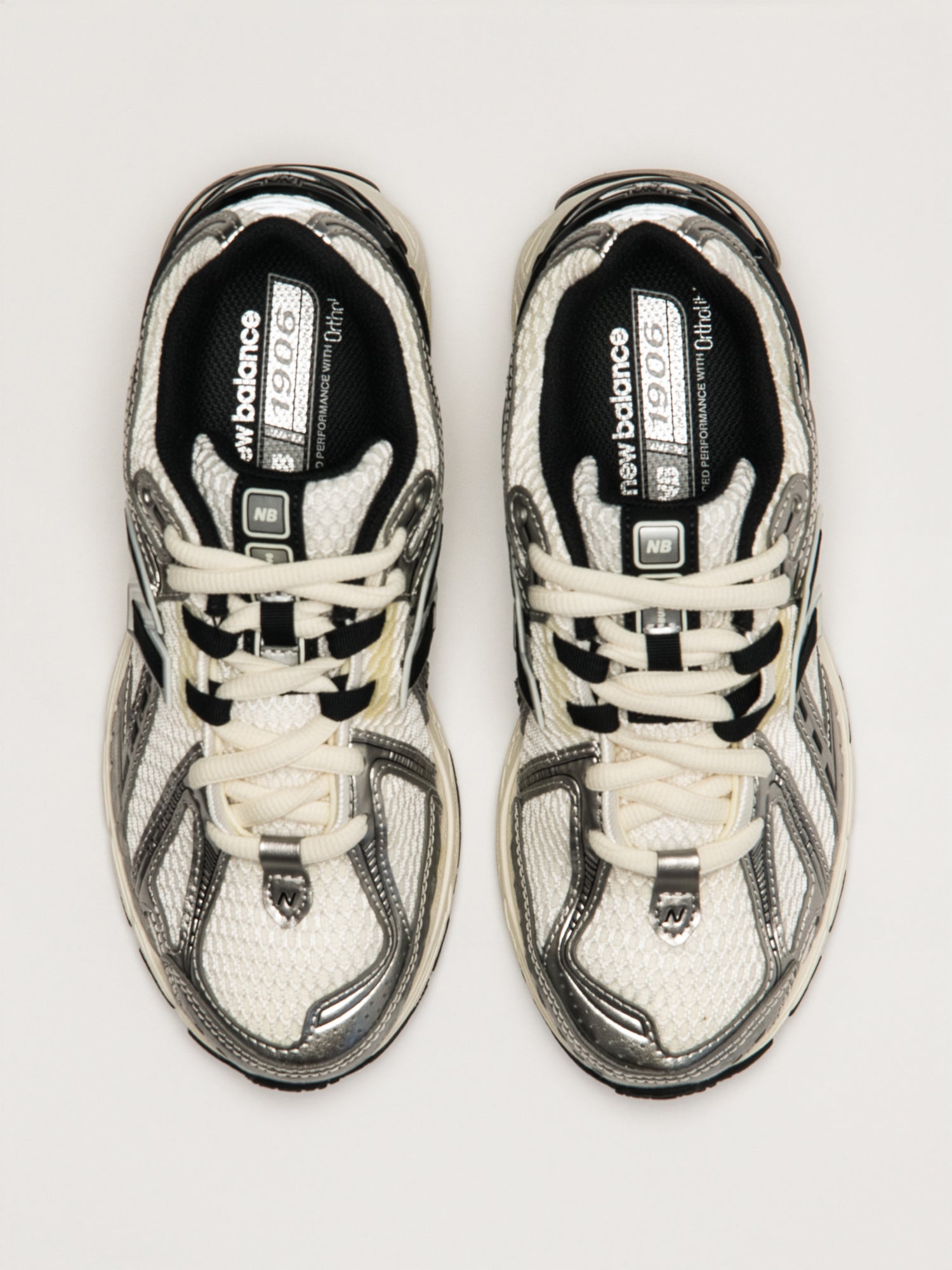 NEW BALANCE 1906 FEMME - ARGENT/NOIR