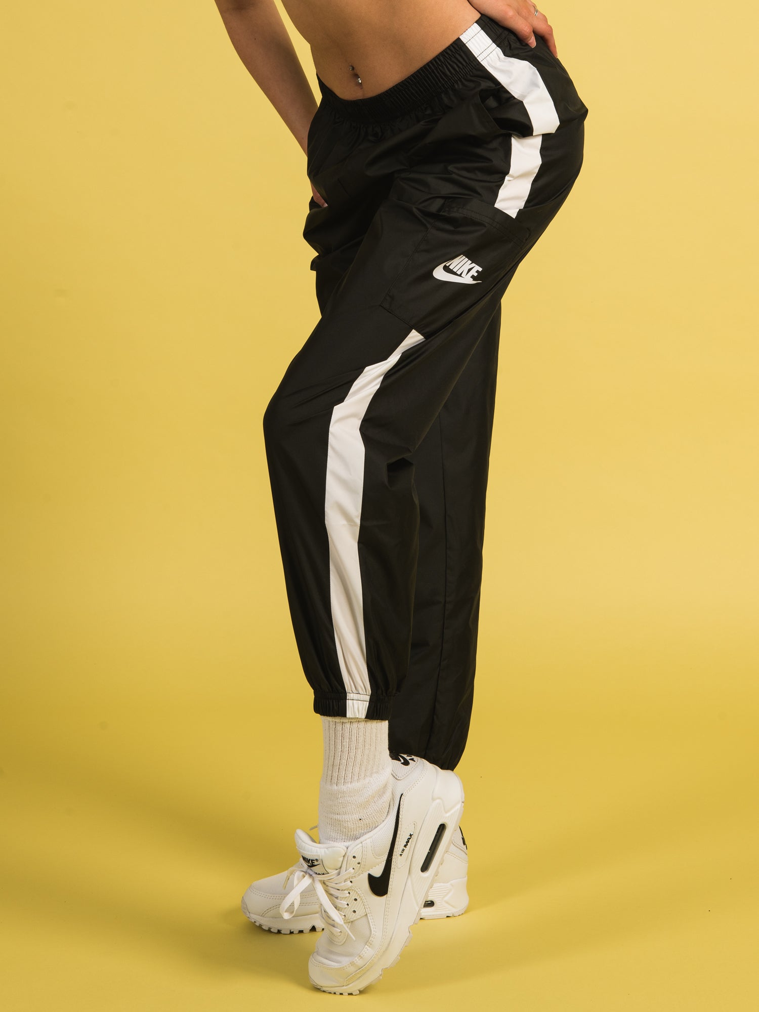 Nike essential woven track pants hot sale