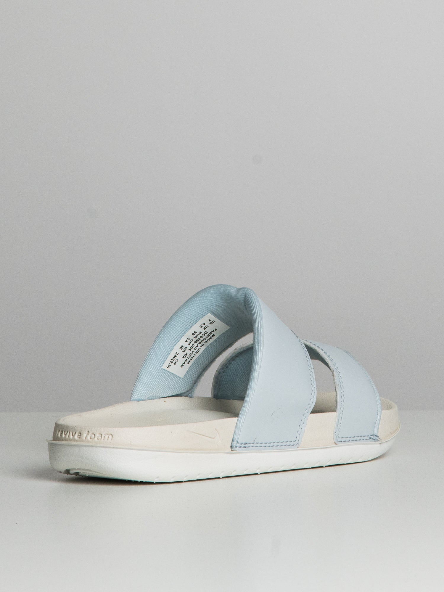 Blue nike slides womens hotsell