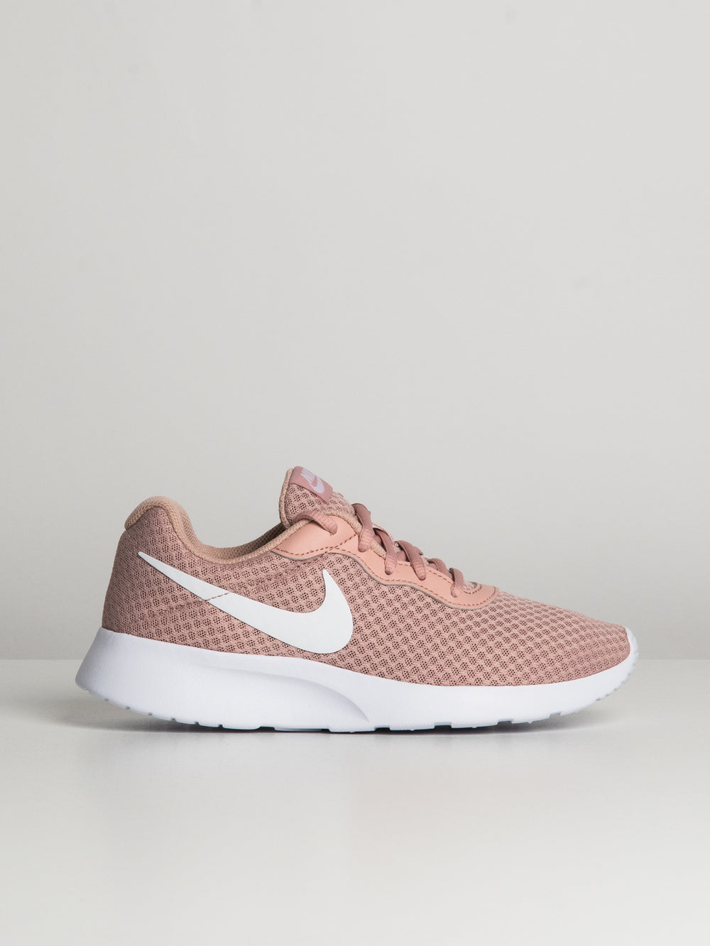 Light pink nike tanjun Clearance