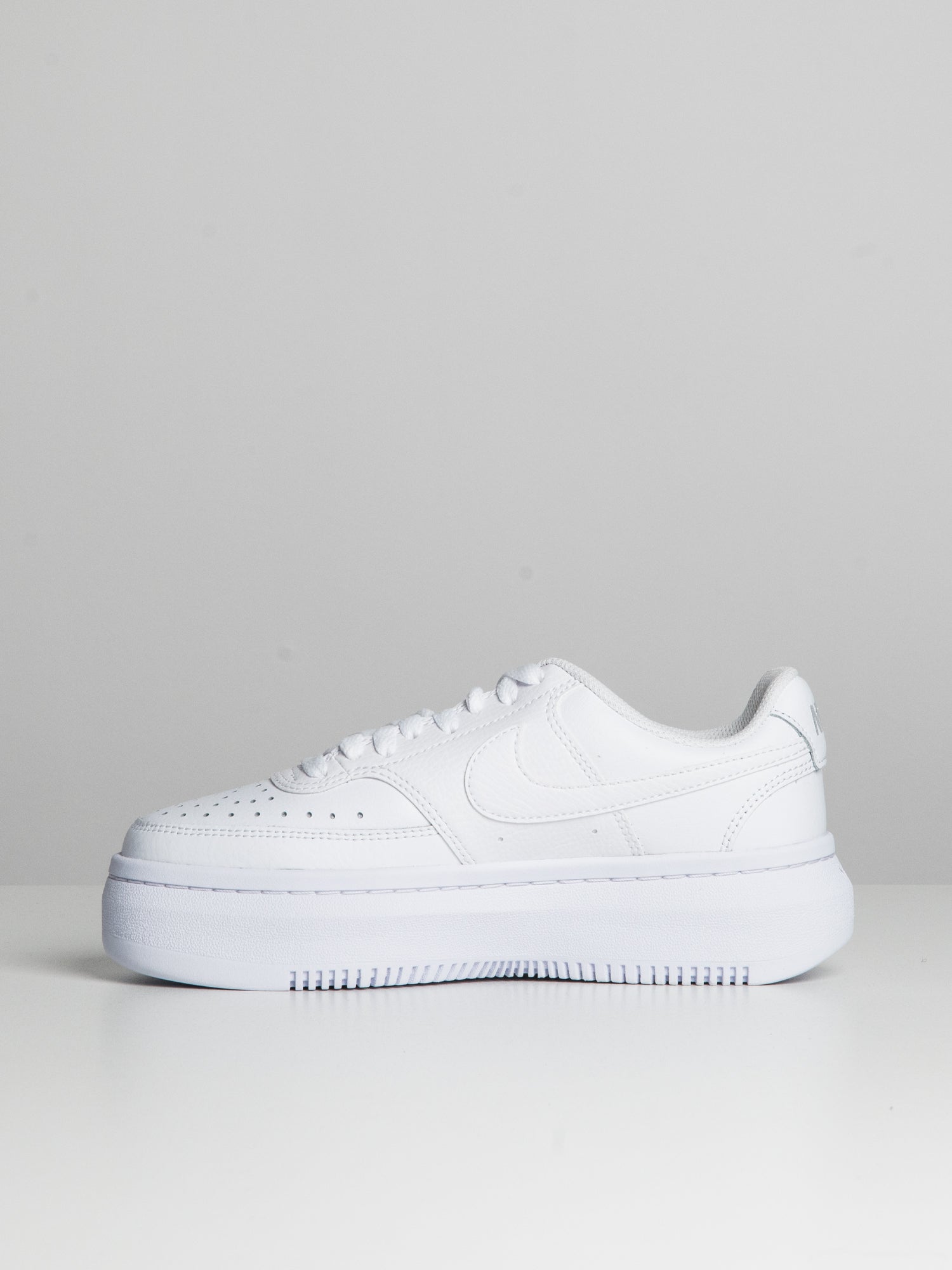 Nike white store leather womens