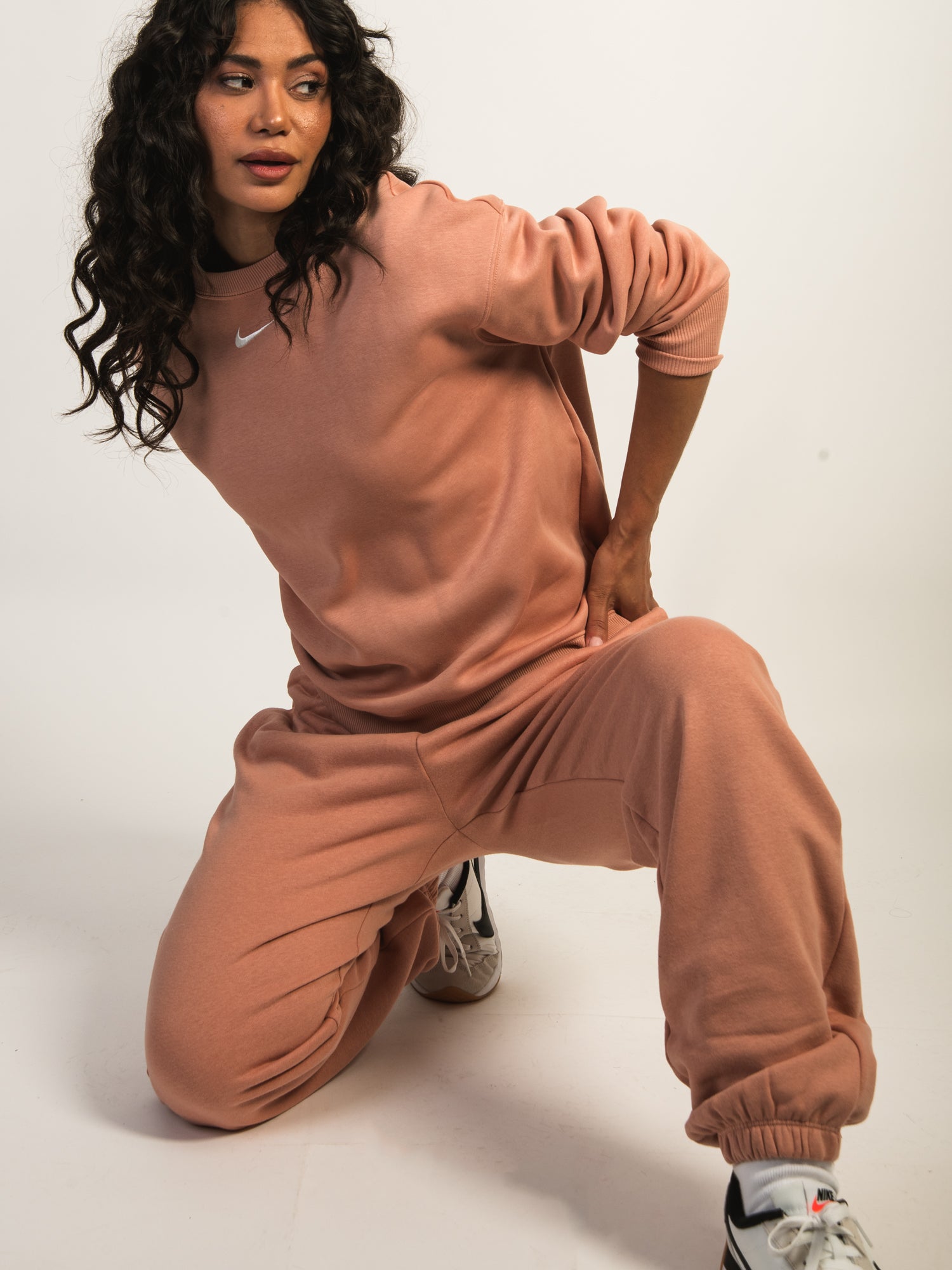 nike womens rose gold clothing