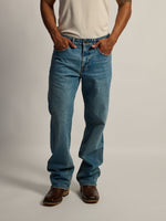 TAINTED BOOT CUT JEAN - MIDWASH