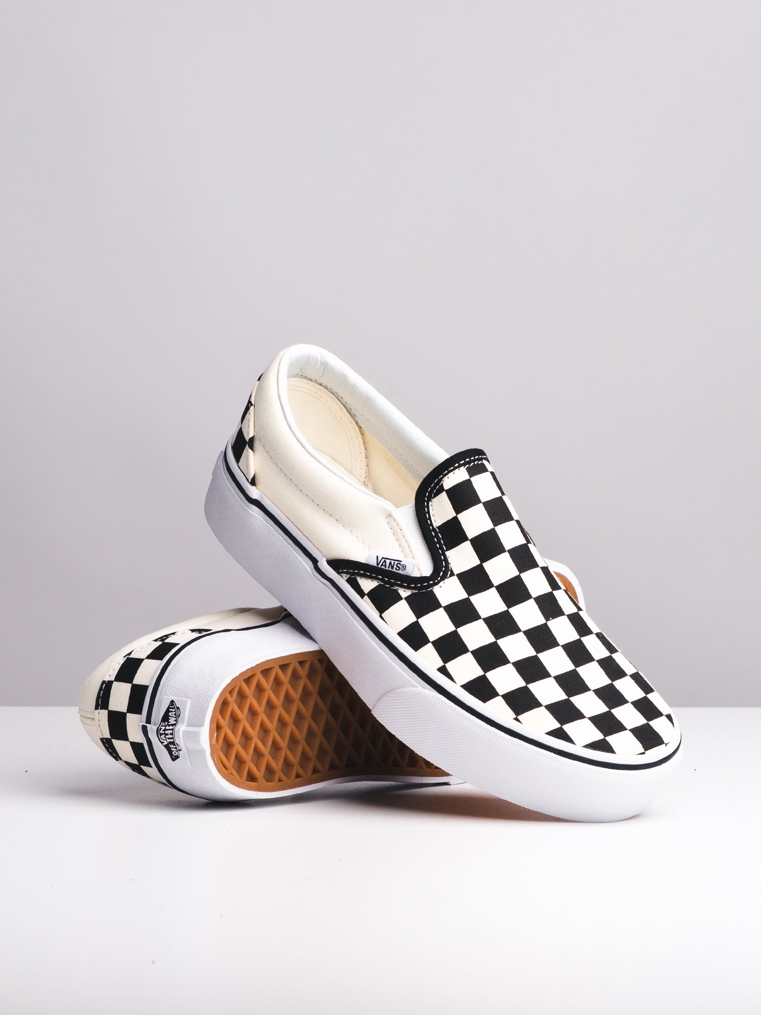 Platform slip on sale checkered vans