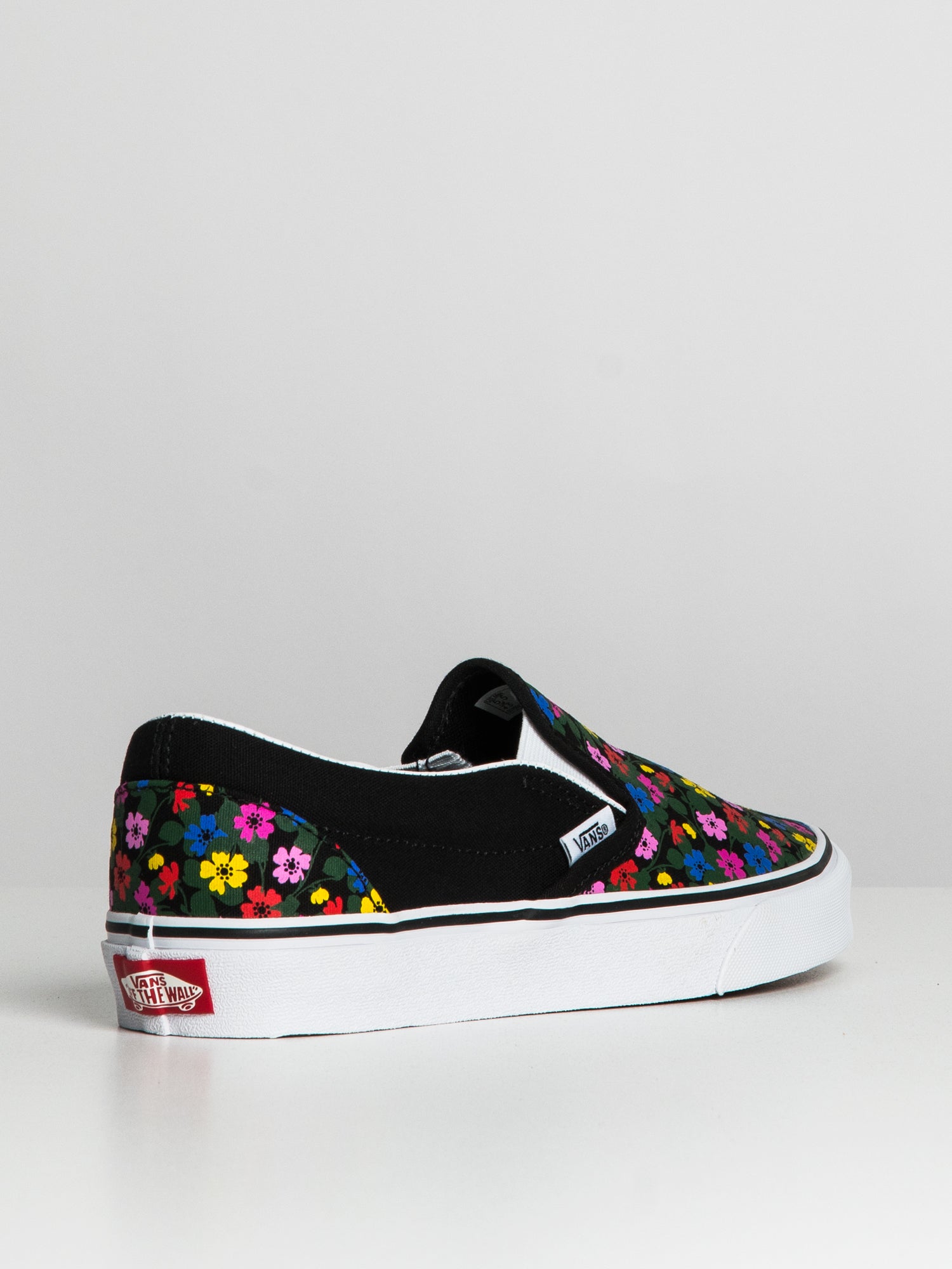 Vans slip on black hot sale floral